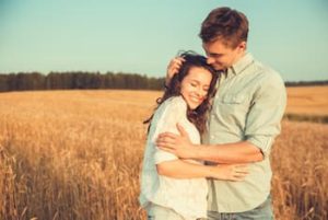 Young couple smiling after LASIK