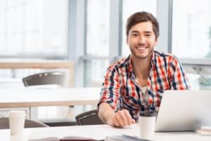 Young man smiling after LASIK