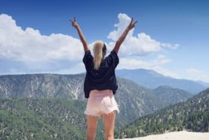 Young woman celebrating after LASIK