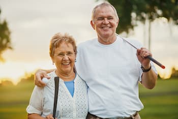 Senior Couple Golfing