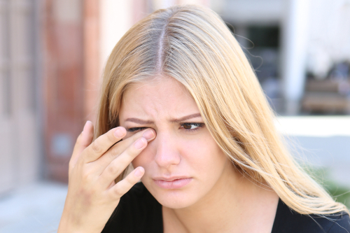 Woman suffering from dry eyes