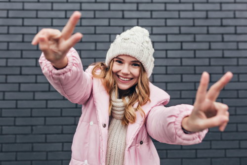 Young woman celebrating after LASIK