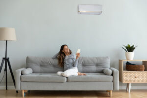 woman sitting on couch