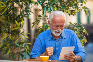 man reading notebook