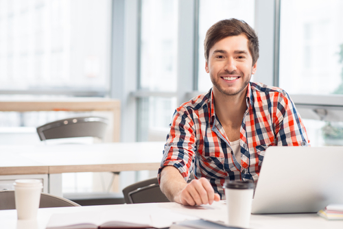 Young man researching LASIK