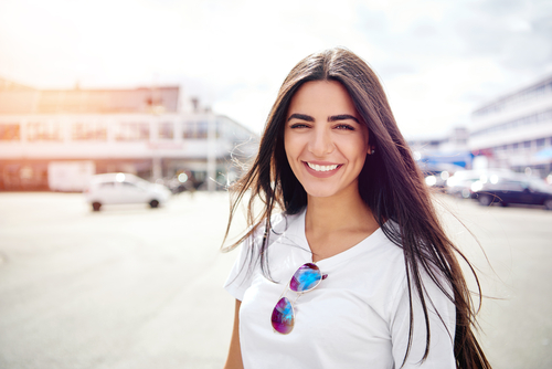 Young woman smiling after LASIK