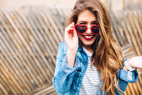 Woman with sunglasses considering LASIK